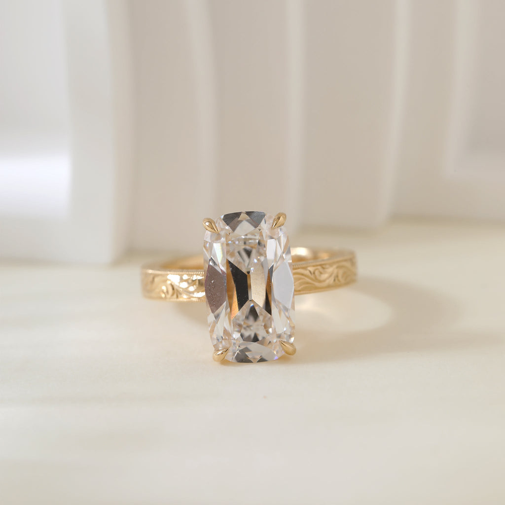 Laboratory-grown diamond ring, 4.68 carats, rectangular old mine cut, hand-carved wide band, four-prong setting.
