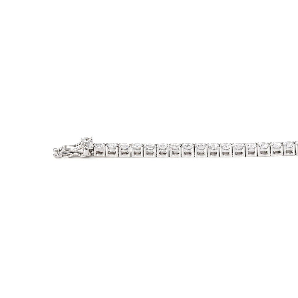 Bestselling 2.5mm lab-grown diamond round-cut tennis bracelet with four-prong setting, perfect for everyday casual wear.