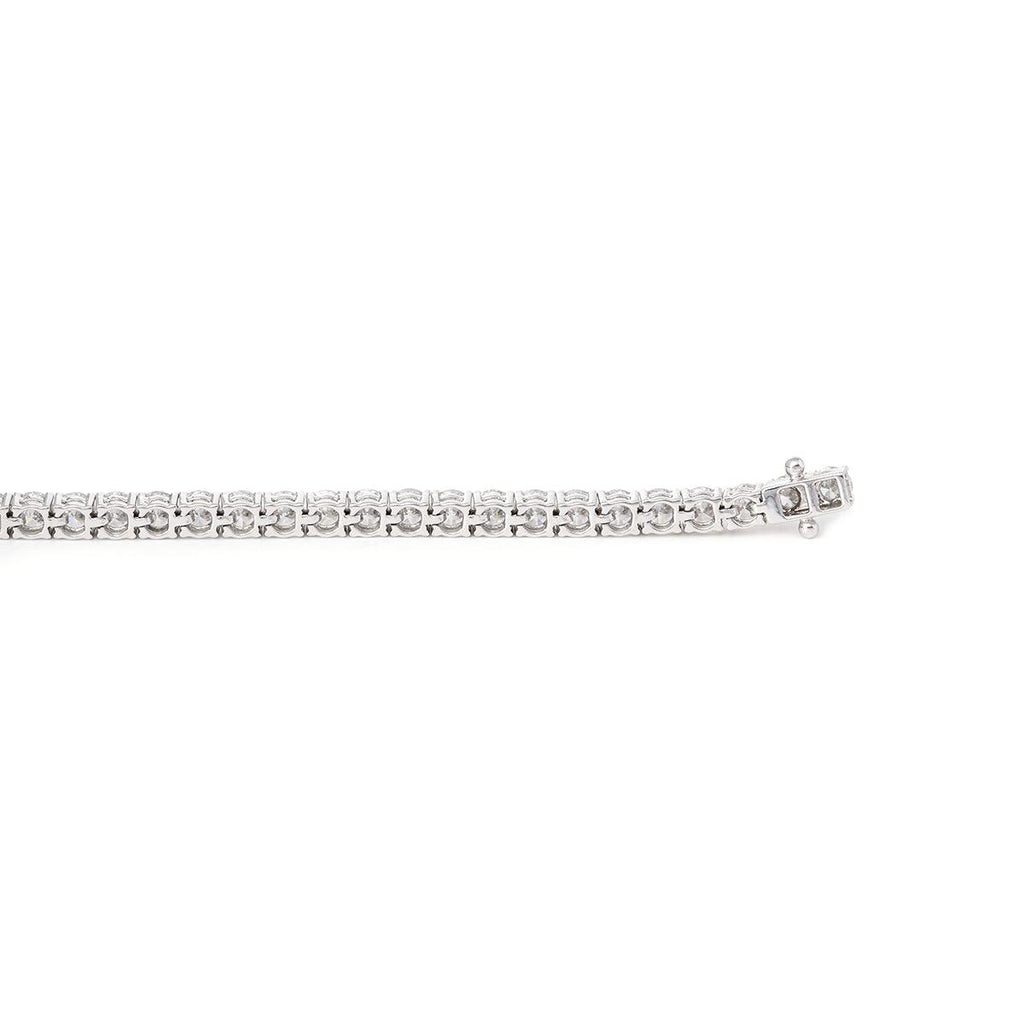 Bestselling 2.5mm lab-grown diamond round-cut tennis bracelet with four-prong setting, perfect for everyday casual wear.
