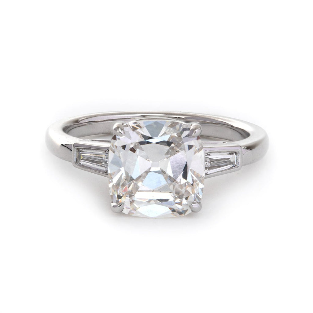 Old mine-cut laboratory-grown diamond three-stone ring, prong setting, custom wedding ring.