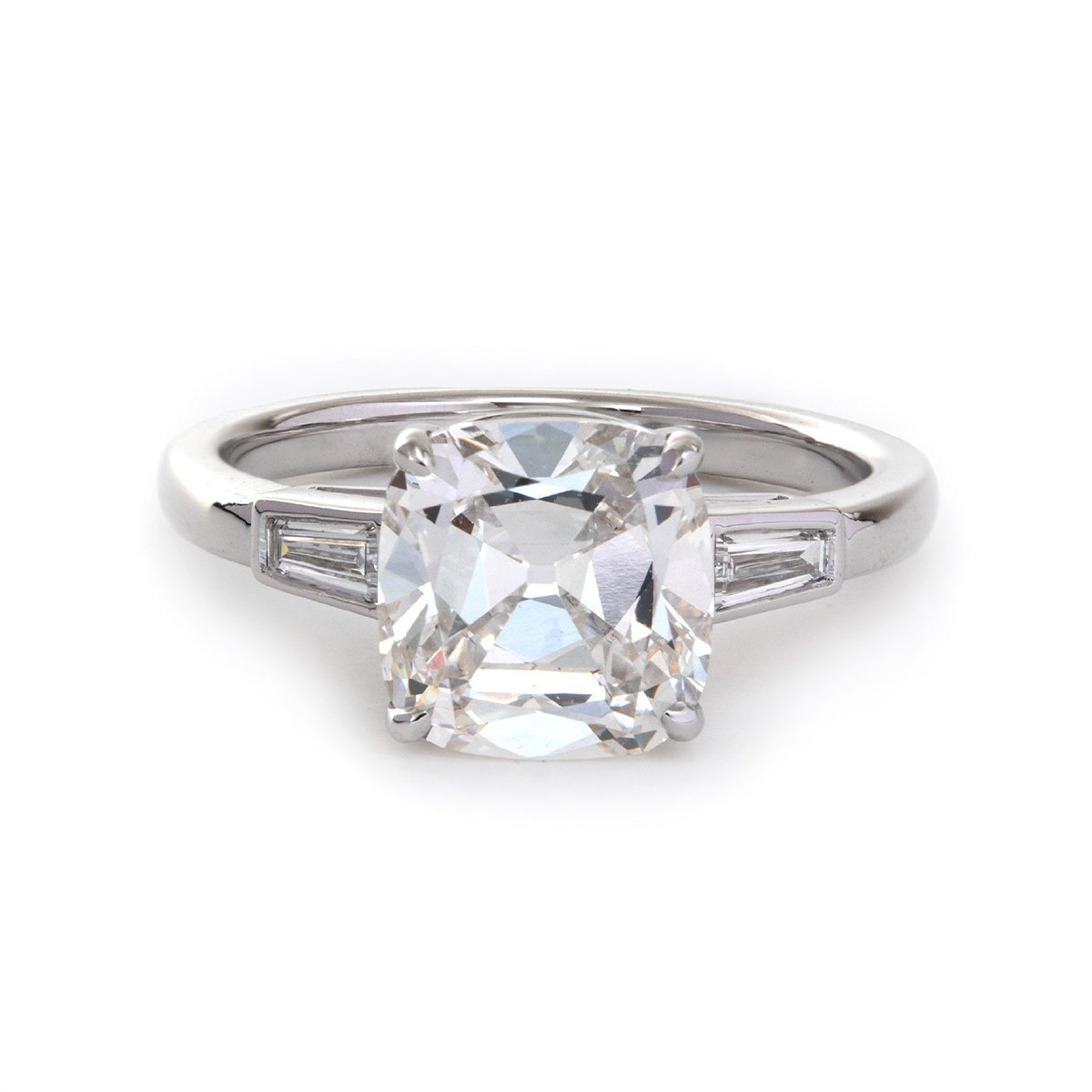 Old mine-cut laboratory-grown diamond three-stone ring, prong setting, custom wedding ring.