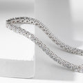 Bestselling 2.5mm lab-grown diamond round-cut tennis bracelet with four-prong setting, perfect for everyday casual wear.