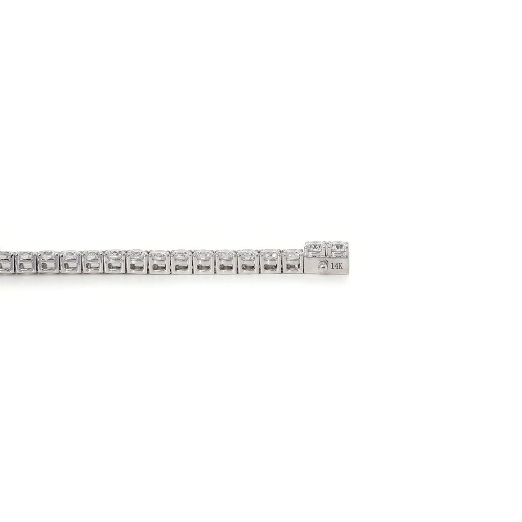 Bestselling 2.5mm lab-grown diamond round-cut tennis bracelet with four-prong setting, perfect for everyday casual wear.