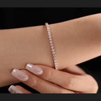 Bestselling 2.5mm lab-grown diamond round-cut tennis bracelet with four-prong setting, perfect for everyday casual wear.