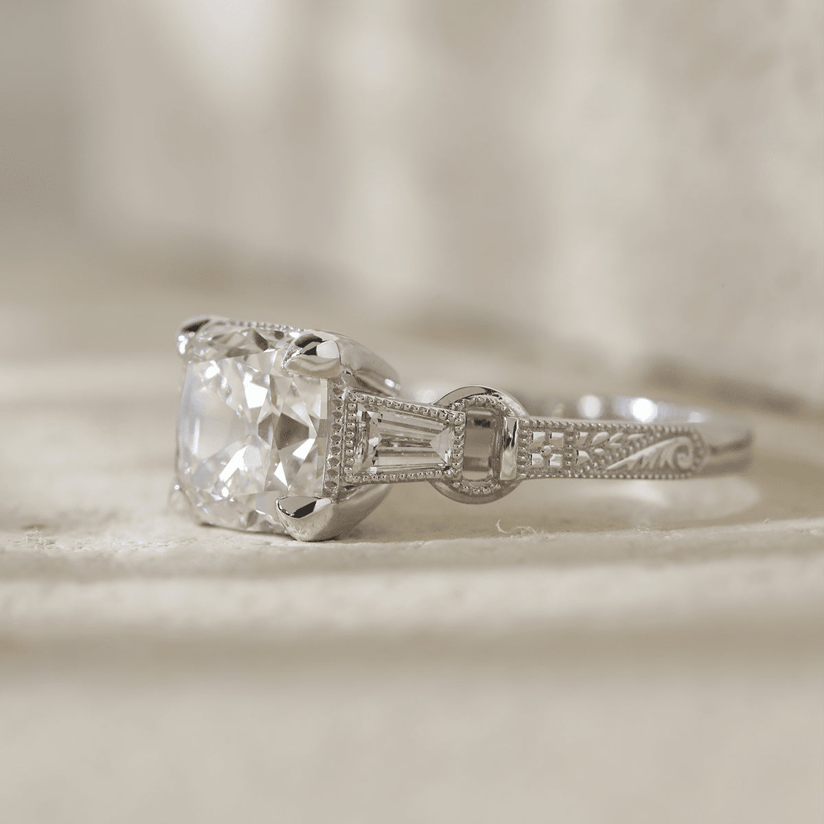 Vintage art style old mine cut 3-carat lab-grown diamond three-stone ring